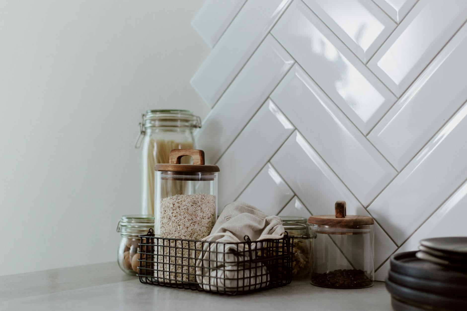 A cozy kitchen with warm textiles and seasonal decor elements.