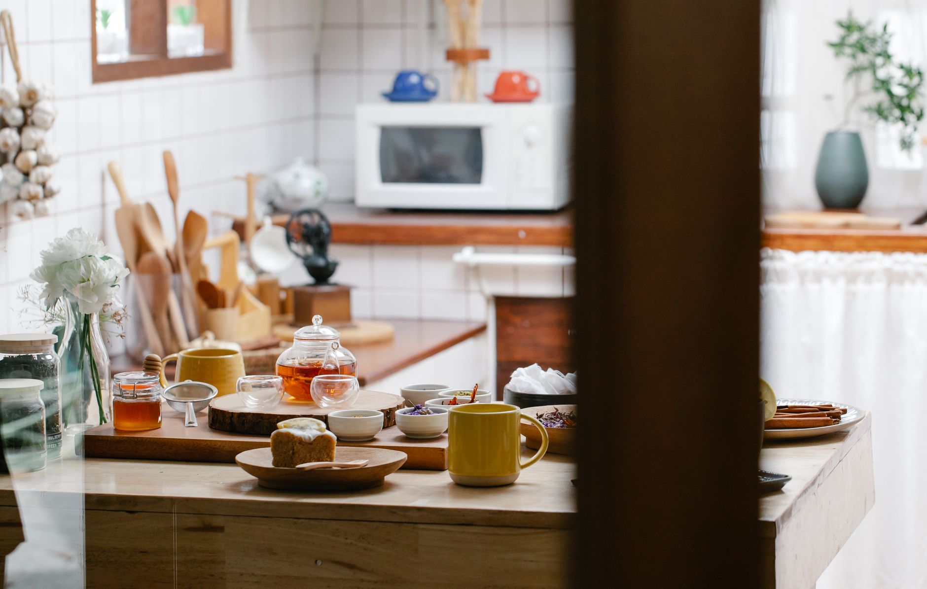 A few essential kitchen tools arranged neatly on a clean countertop